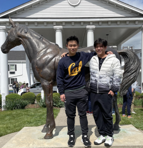 Zhang and Yang pose at the Tournament of Champions at the University of Kentucky last spring.